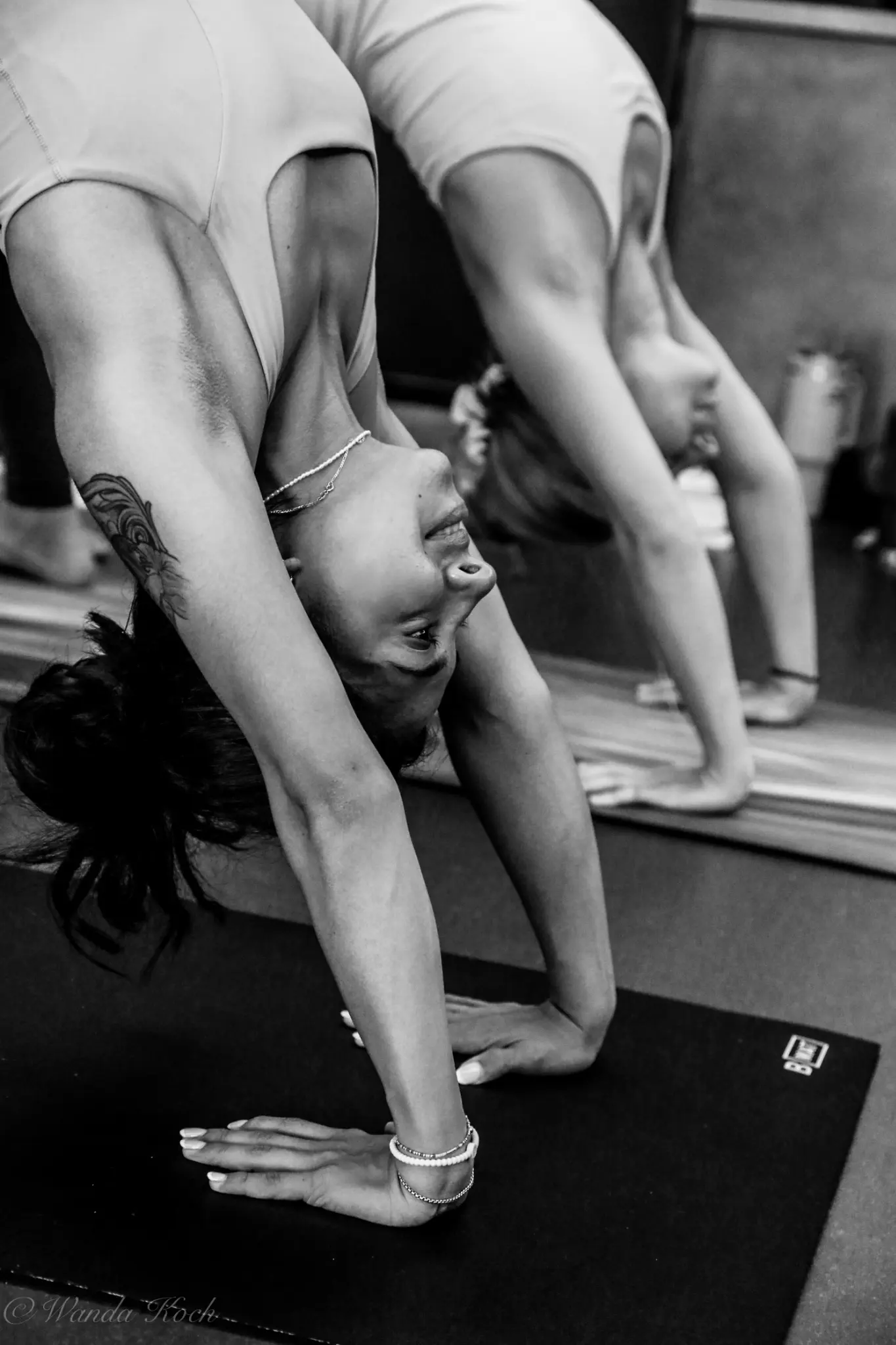 Abi practicing yoga during her training