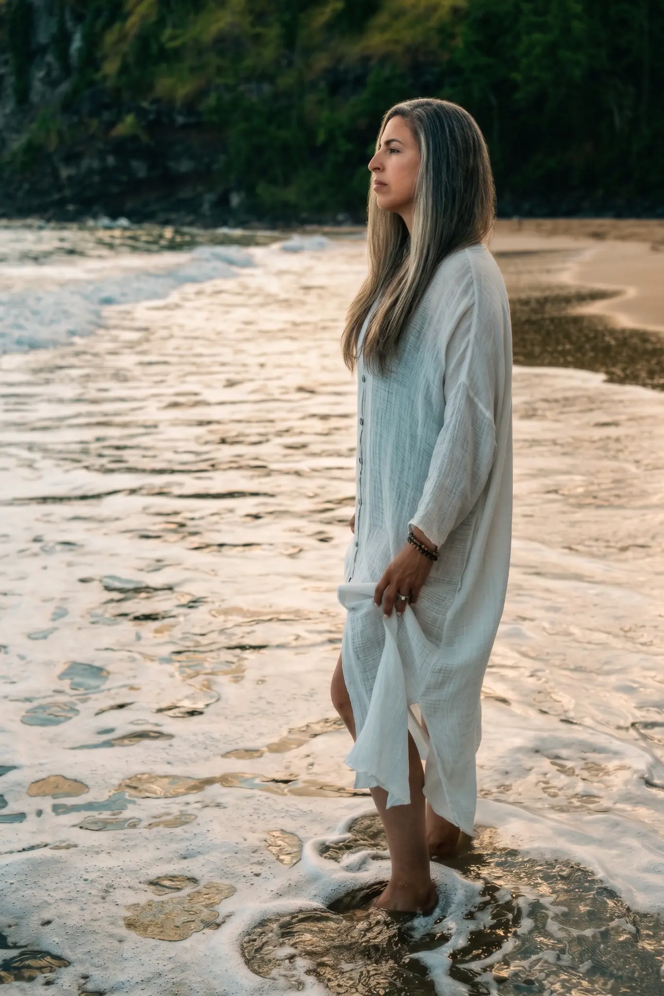Angela Soto standing at the shoreline